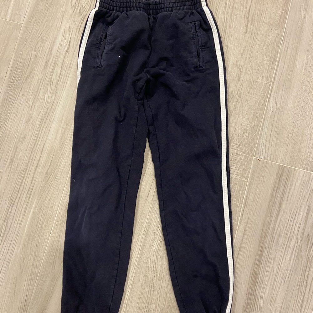 Navy blue joggers with 2 white stripes